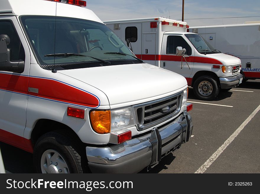 Red and white ambulances ready for emergencies