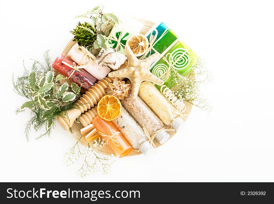 Soap assortment in a basket with a white background