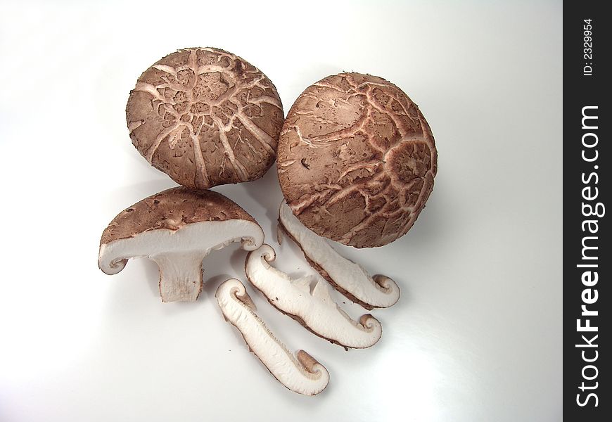 Fresh Asian Mushrooms Close-up with Several Slices