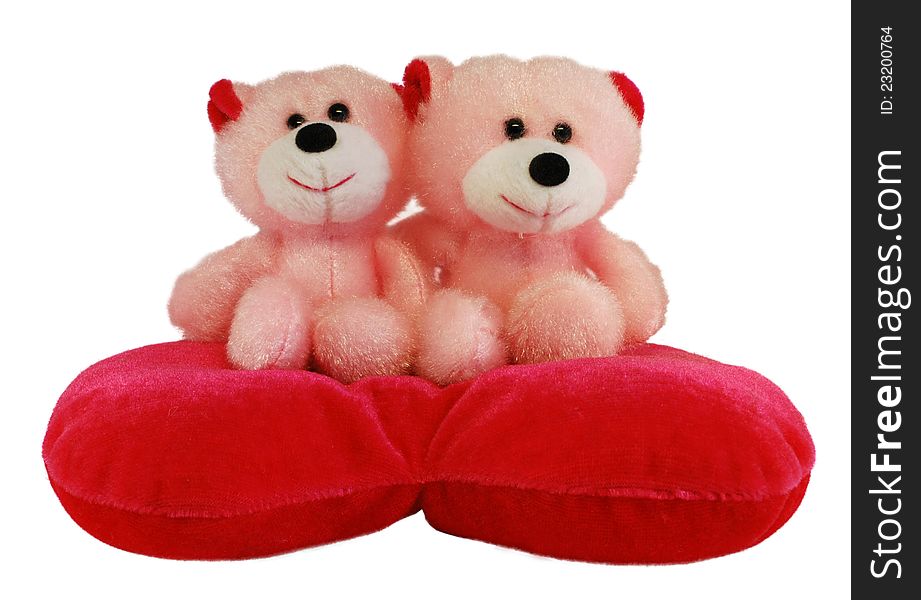 Two teddy bears sit on the heart. Two teddy bears sit on the heart.