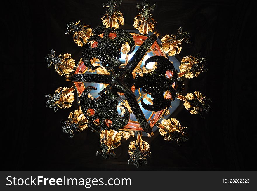 A picture of a chandelier in ortodox church