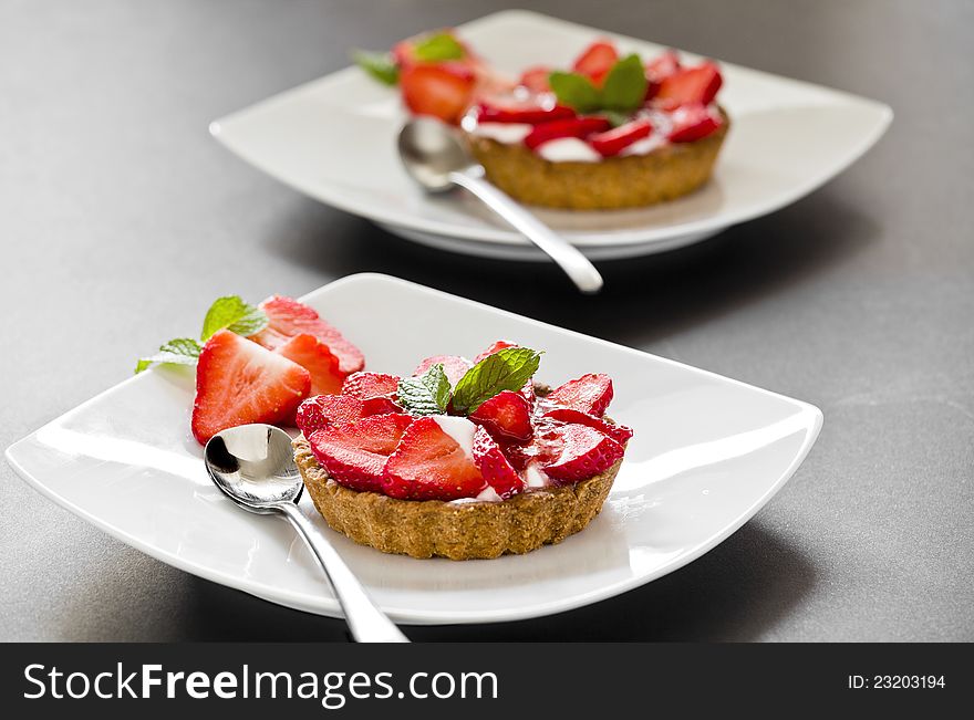 Photograph of a tasty strawberry pie on a plate. Photograph of a tasty strawberry pie on a plate