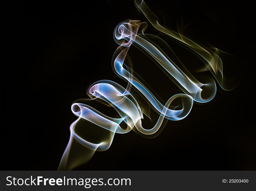 Smoke against a black background