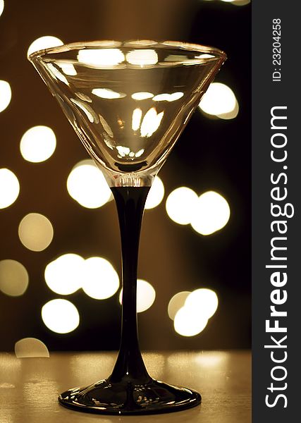 Martini wineglass with bokeh on the background. Martini wineglass with bokeh on the background