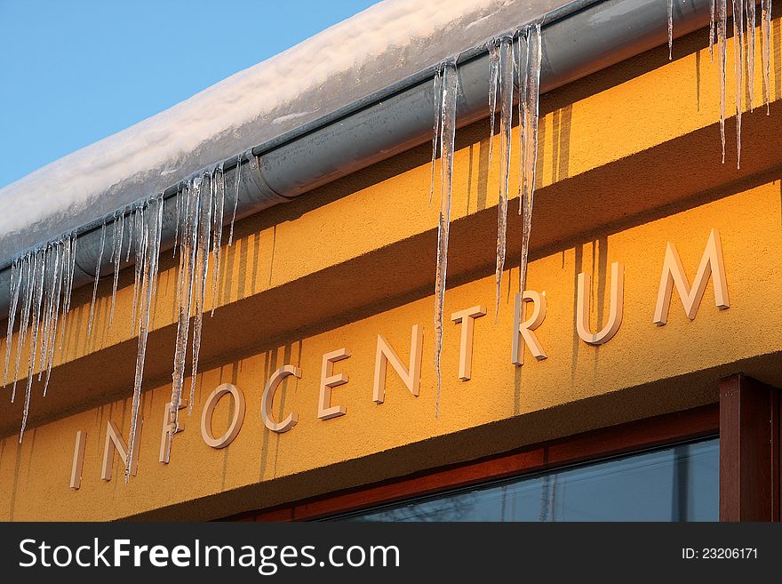 Inscription Infocentrum on a wall of a Information building