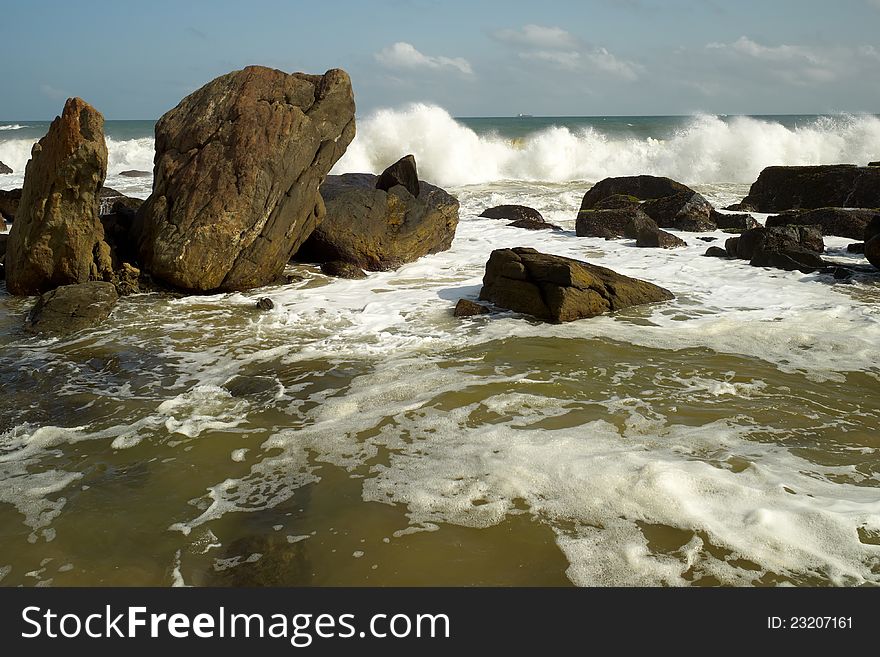 Ocean Wave Crashes Rock
