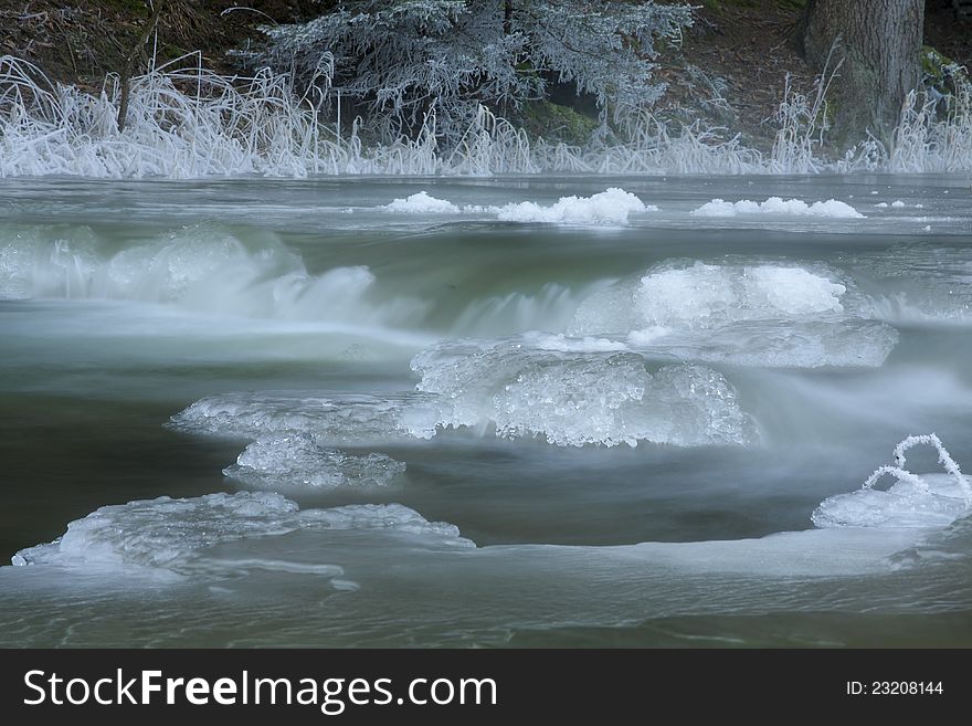 Ice formations on a frozen creek