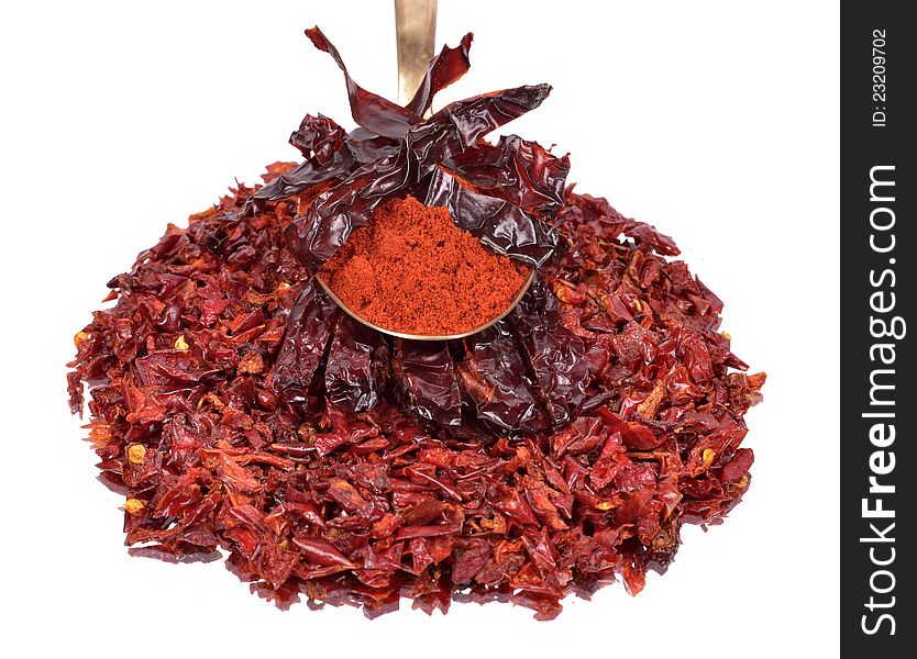 Red Peppers dried,crushed,spicy chili powder , isolated white background