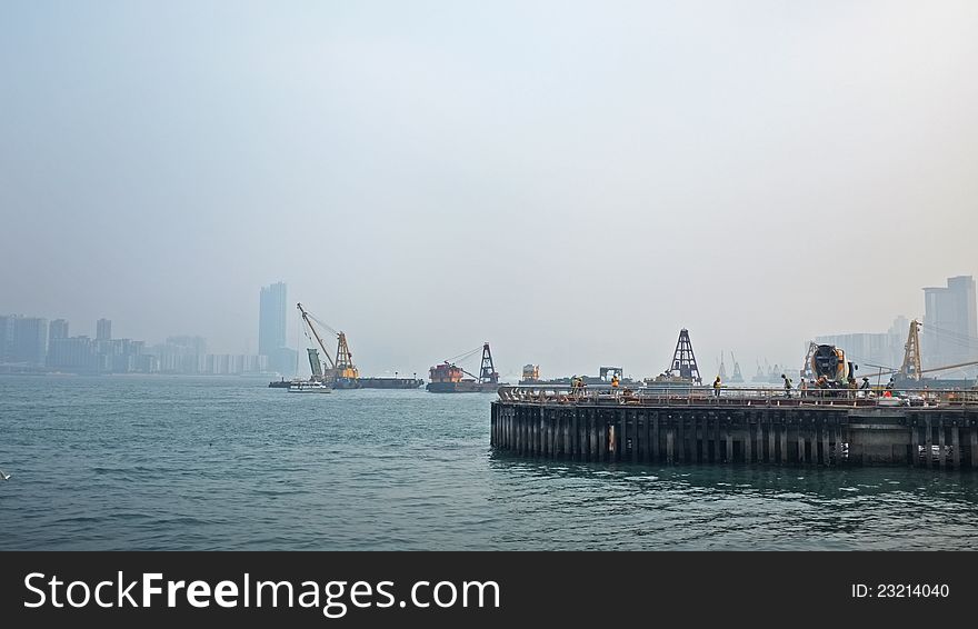 Man at work on harbor