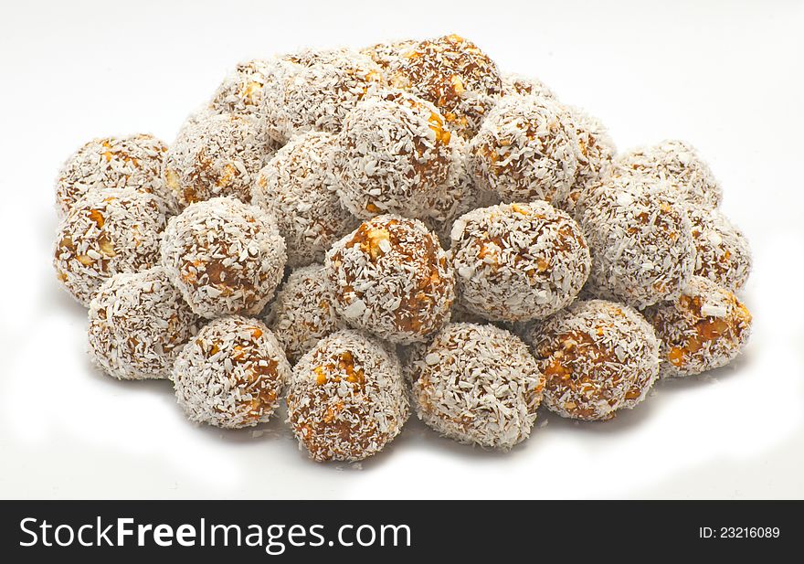 Homemade cookies with coconut on white background