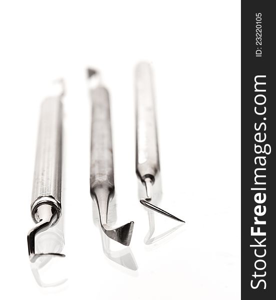 Set of metal medical equipment tools for teeth dental care. Set of metal medical equipment tools for teeth dental care