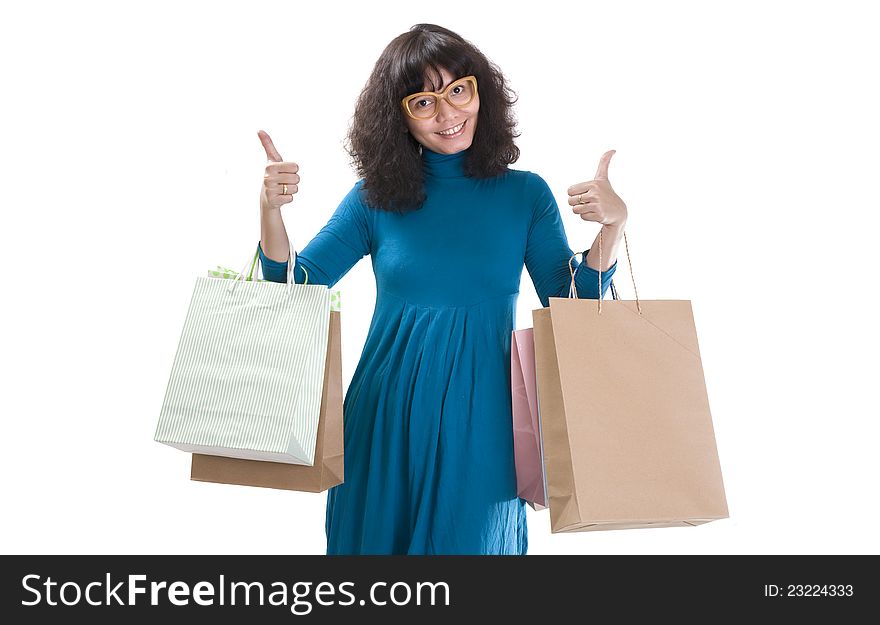 A happy shopping woman isolated over white background