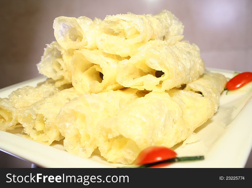 A fried Chinese food made of ewe's milk.It is like cheese in west food.