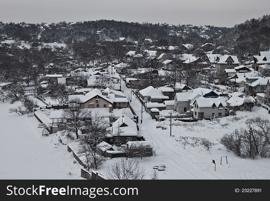 Village in winter with snow