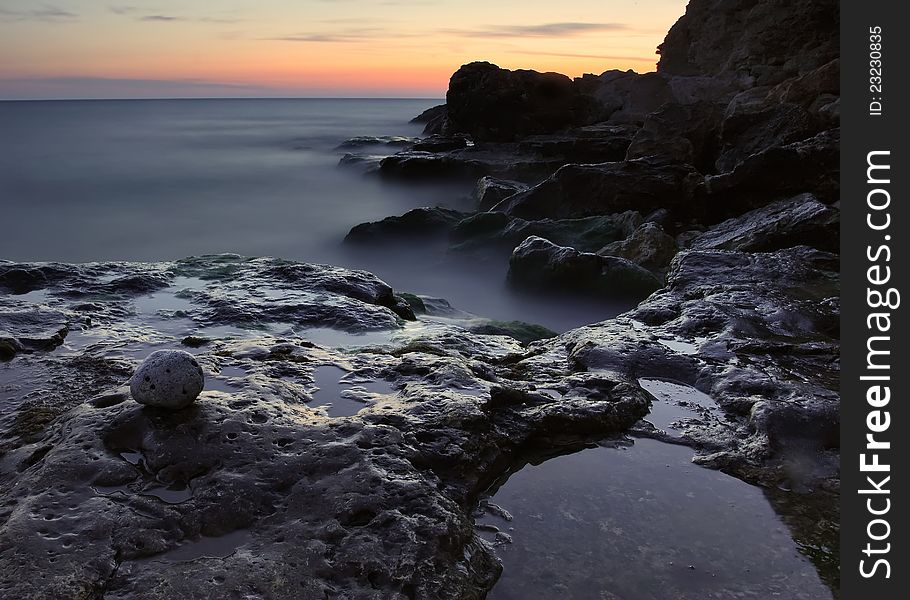 Nightly sea and the rock