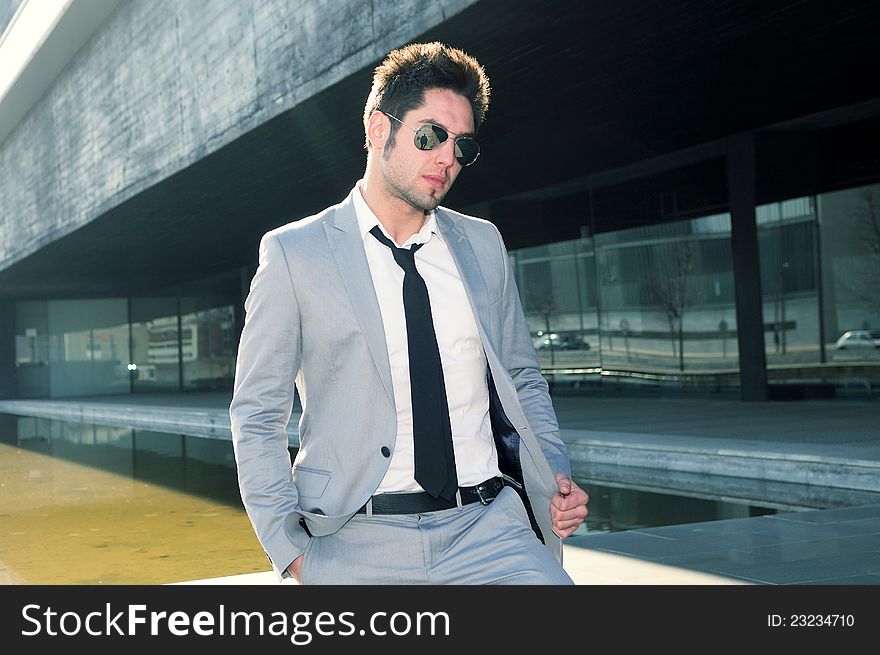 Handsome young business man smiling