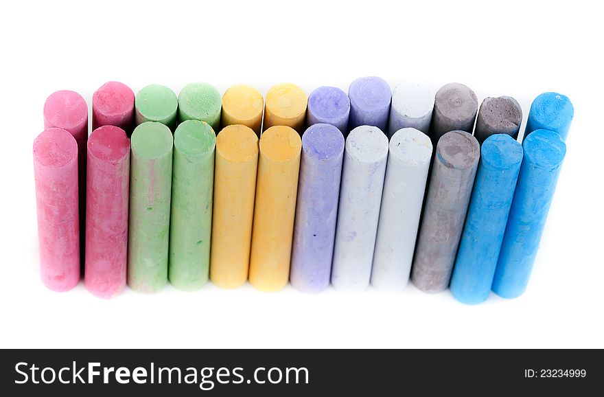 Box with children's crayons on a white background. Box with children's crayons on a white background