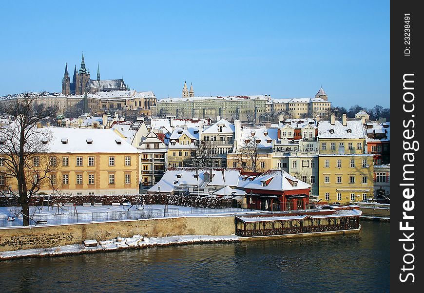 View of Prague Castle from Charles Bridge in winter