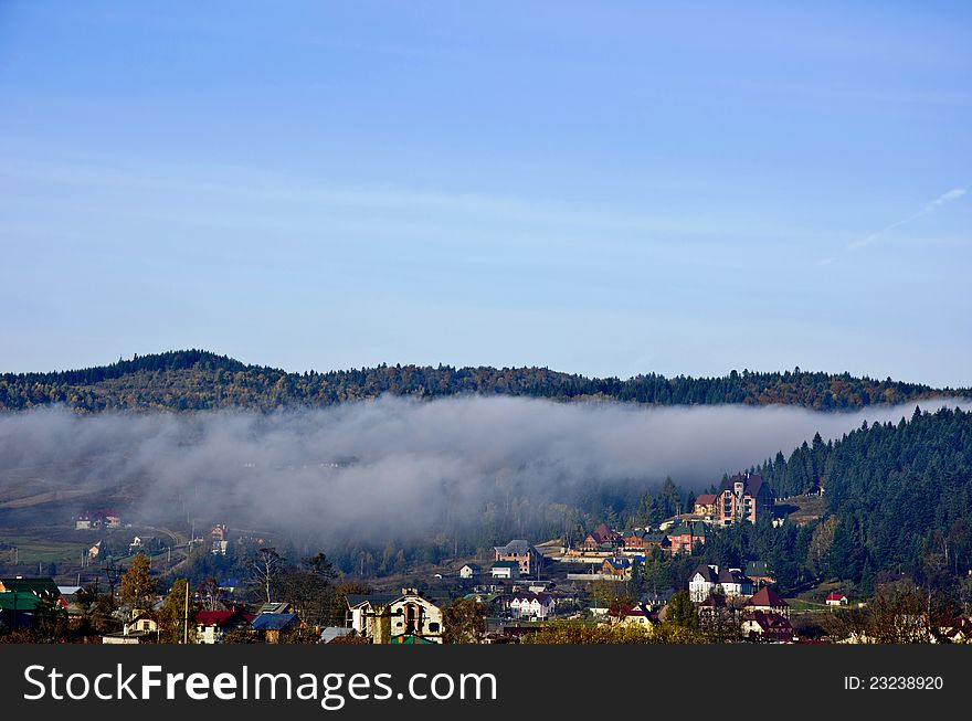 Foggy morning in Carpathians. Settlement Shidnitsa.