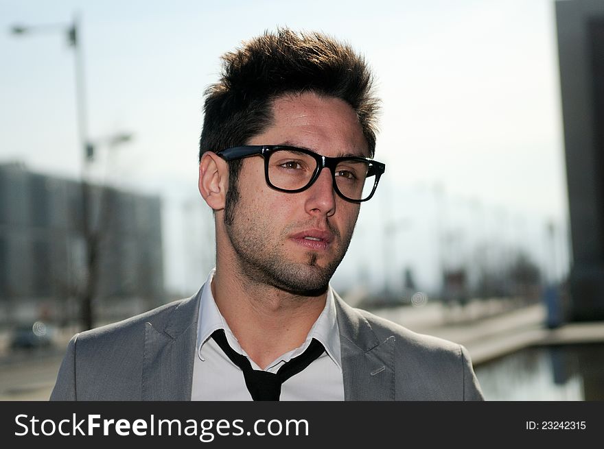 Handsome young businessman with eyesglasses