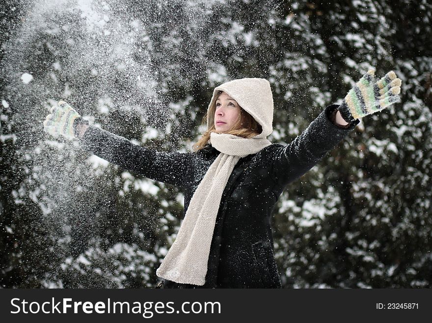 Young woman in park enjoying winter. Young woman in park enjoying winter