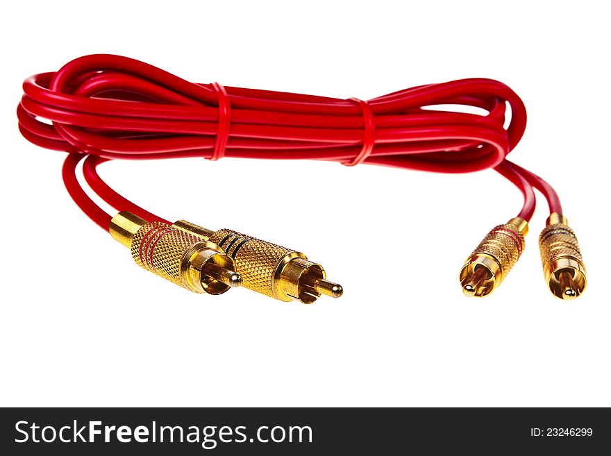 Red cinch audio cable with golden plugs isolated over white background. Red cinch audio cable with golden plugs isolated over white background.