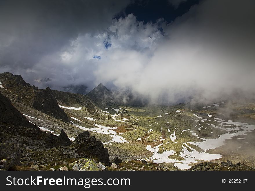 Dramatic cloud scenery in high mountains