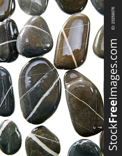 Pebbles black rock with white inner strip. Pebbles black rock with white inner strip
