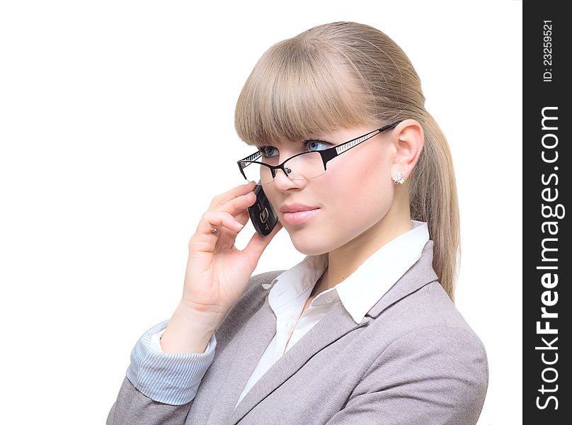 Pretty businesswoman in glasses with cell phone. Pretty businesswoman in glasses with cell phone