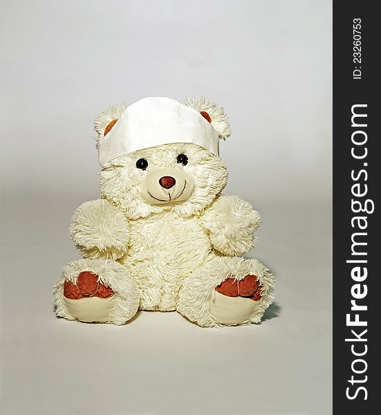 A white colored plush bear for medical themes. A white colored plush bear for medical themes.