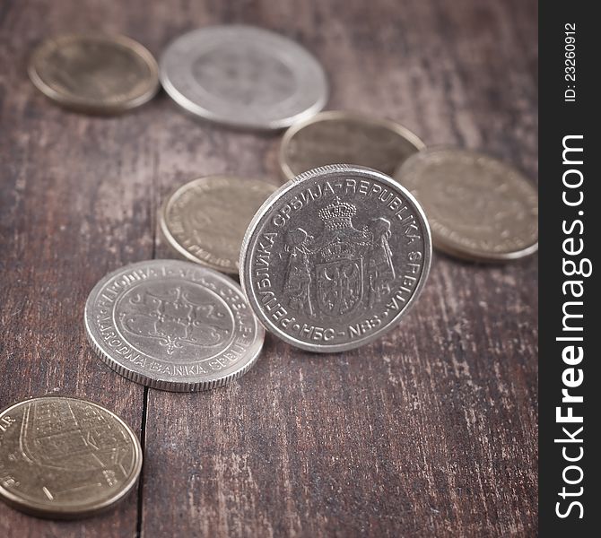 Close up of dinar coins on table