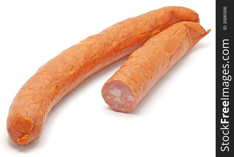 Two pieces of sausage on white background