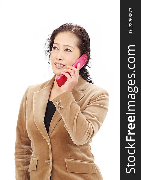 Asian business woman calling by cellular phone