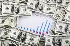 Business Chart Surrounded By Money Stock Photo