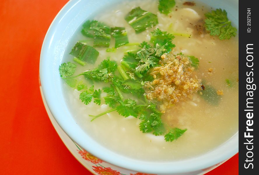 Thai food boiled rice in chicken soup