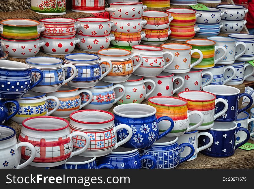 Many colorful handmade ceramic cups on the market. Many colorful handmade ceramic cups on the market