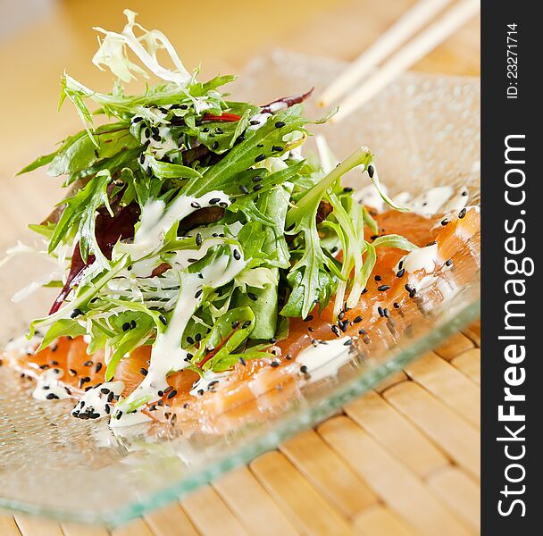 Smoked Salmon Salad on glass plate