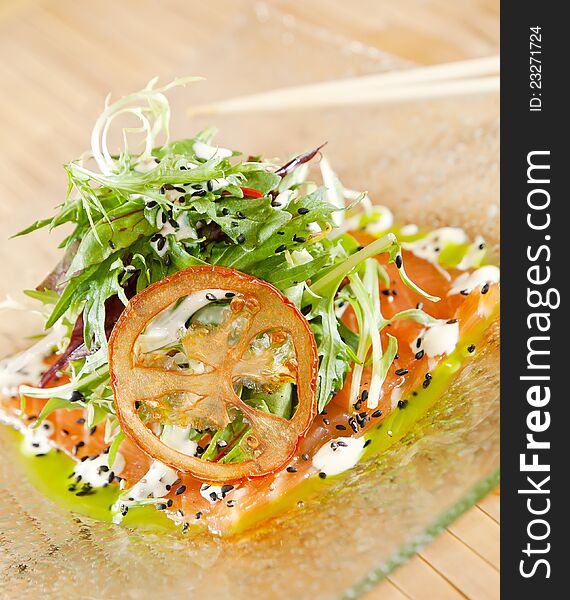 Smoked Salmon Salad on glass plate