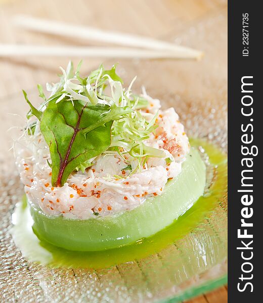 Mashed potato with caviar souffle, on glass plate, served for restaurant