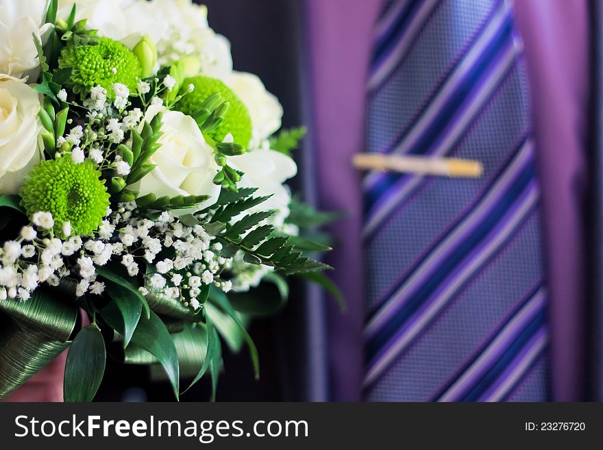 Man hold bouquet in hand. Man hold bouquet in hand