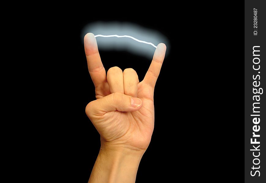 Electric discharge between fingers on a black background