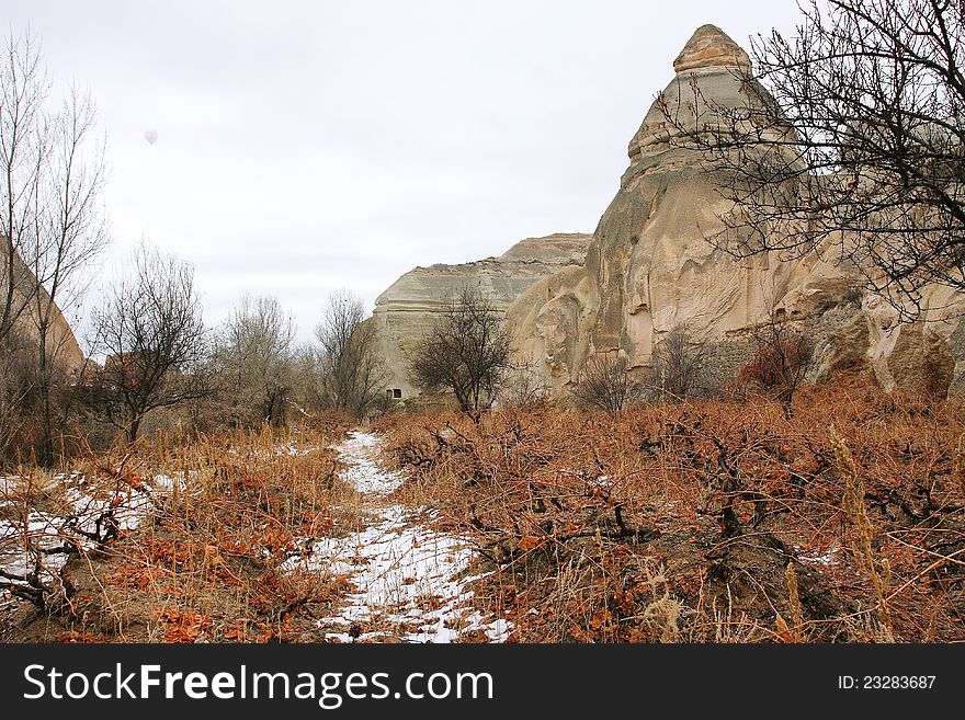 Rocks and the grape valley at the winter in Cappadocia, Turkey. Rocks and the grape valley at the winter in Cappadocia, Turkey.