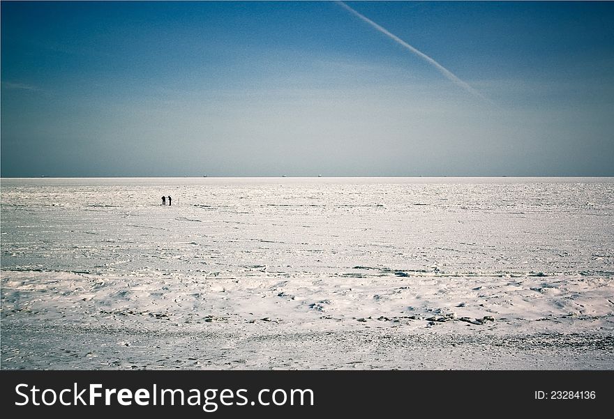 Odessa, frozen Black sea, people walk on water. Odessa, frozen Black sea, people walk on water