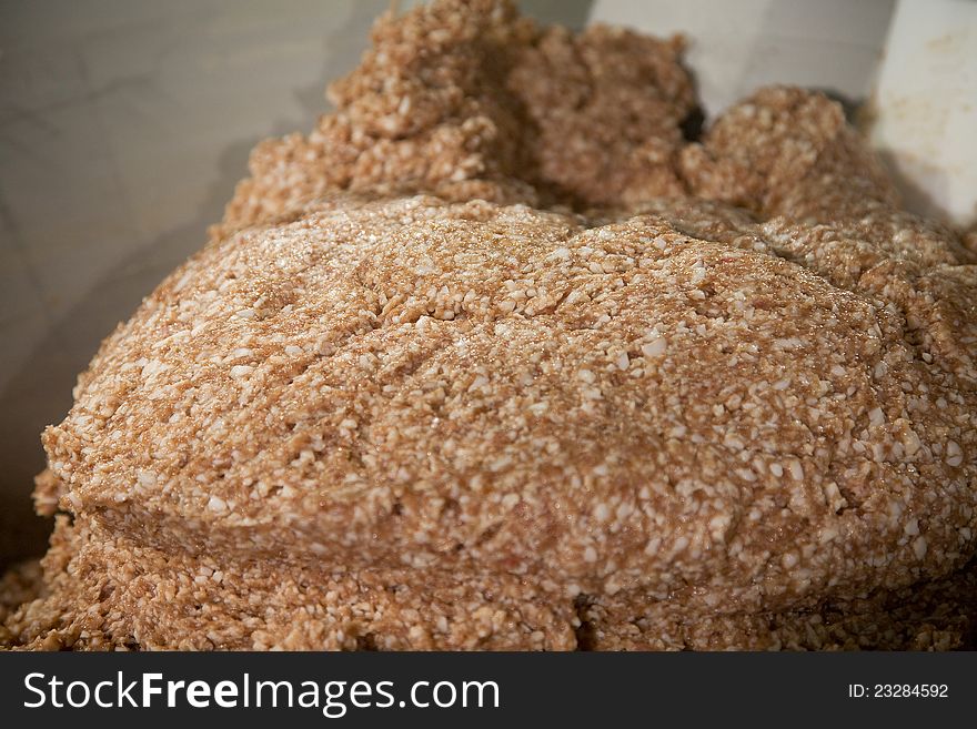 Minced meat for sausages in a meat factory