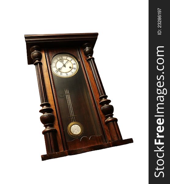 Old wall clock in a wooden enclosure, glass door