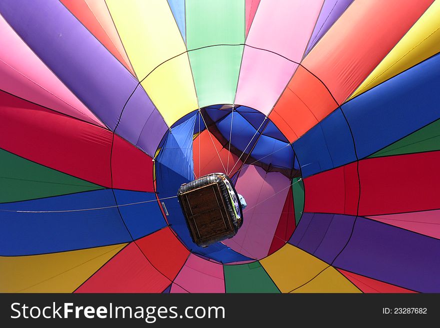 Rainbow colors create pattern from below the basket. Rainbow colors create pattern from below the basket.