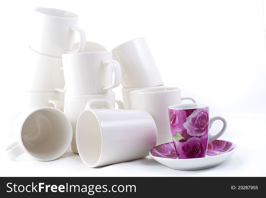 Many stacked of white cups on white background