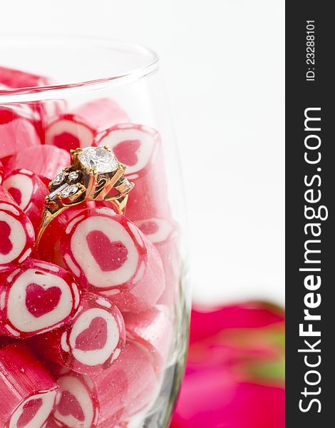 Diamond Ring and Candy in wine glass