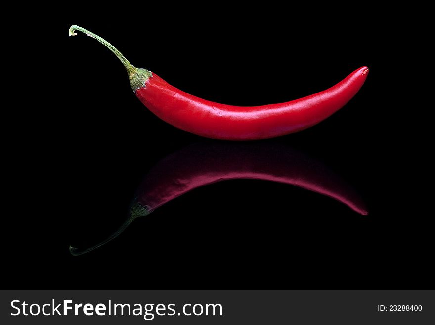 Red hot chilli paper isolated on black background. Red hot chilli paper isolated on black background