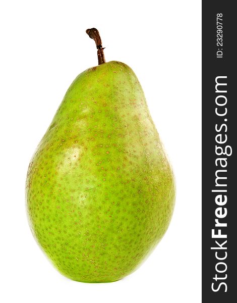 Green ripe pear on a white background close up. Green ripe pear on a white background close up.